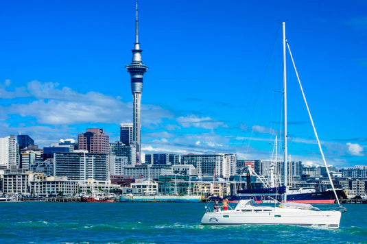 Tourists enjoying Auckland harbour cruise